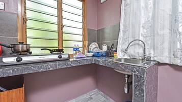 Room, 1 Bedroom | Private kitchen | Coffee/tea maker, dining tables