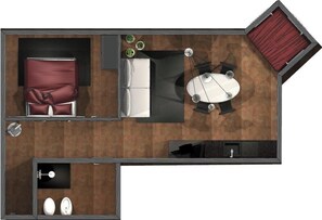 Un plan d’aménagement de chambre d’hôtel comprenant un lit, un bureau, une chaise, une petite table, un canapé et une salle de bain.
