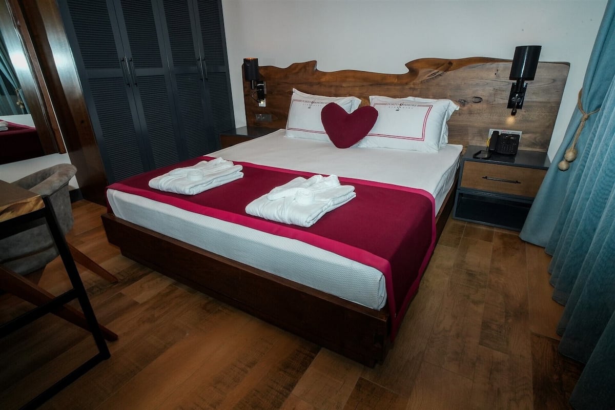 EROS SUITE | 1 slaapkamer, luxe beddengoed, een minibar met enkele gratis items