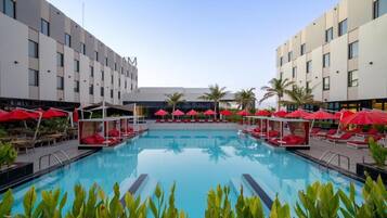Outdoor pool, free cabanas, pool umbrellas