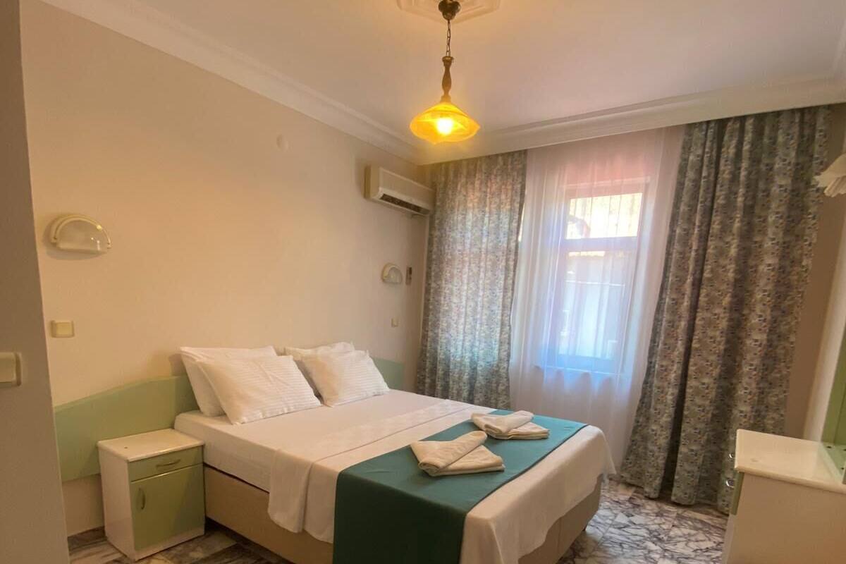 Apartamento família | 1 quarto, Wi-Fi de cortesia, roupa de cama