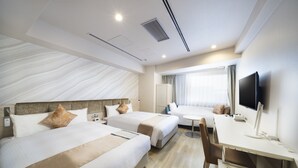 A hotel room with two beds, a desk, a chair, a TV, and a window with curtains. - Rembrandt Style Naha (Naha)