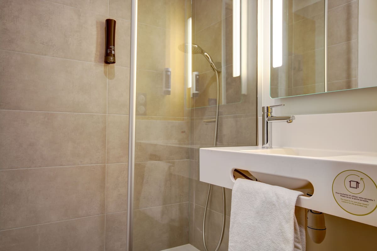 shower, towels, soap, shampoo