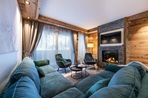 Appartement VL A02 | Wohnbereich | 100-cm-Flachbildfernseher mit Digitalempfang, Fernseher