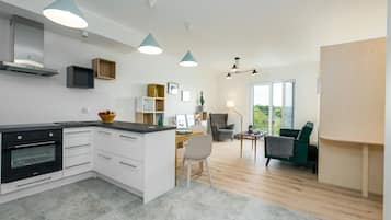 Apartment, 1 Schlafzimmer, Balkon, Flussblick | Wohnzimmer