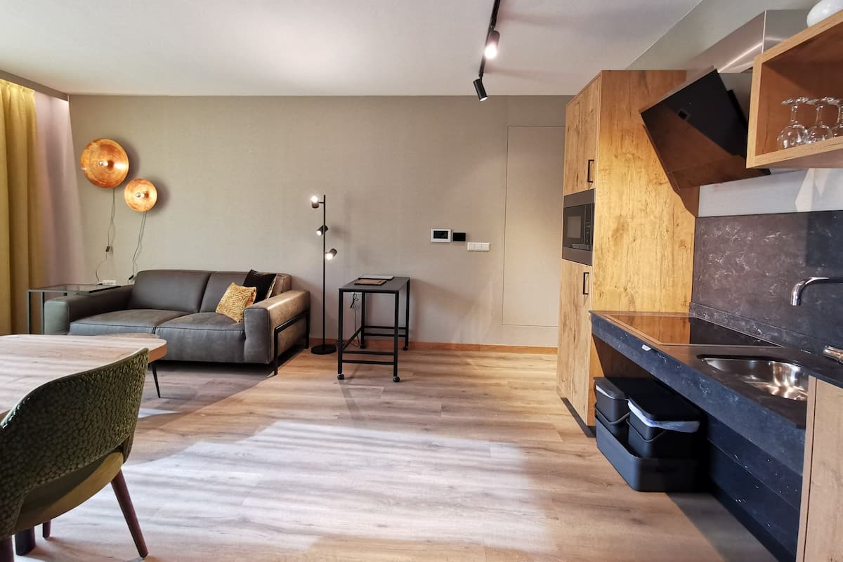 Apartemen | Area keluarga | TV layar datar
