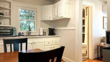 Fridge, microwave, coffee/tea maker, toaster