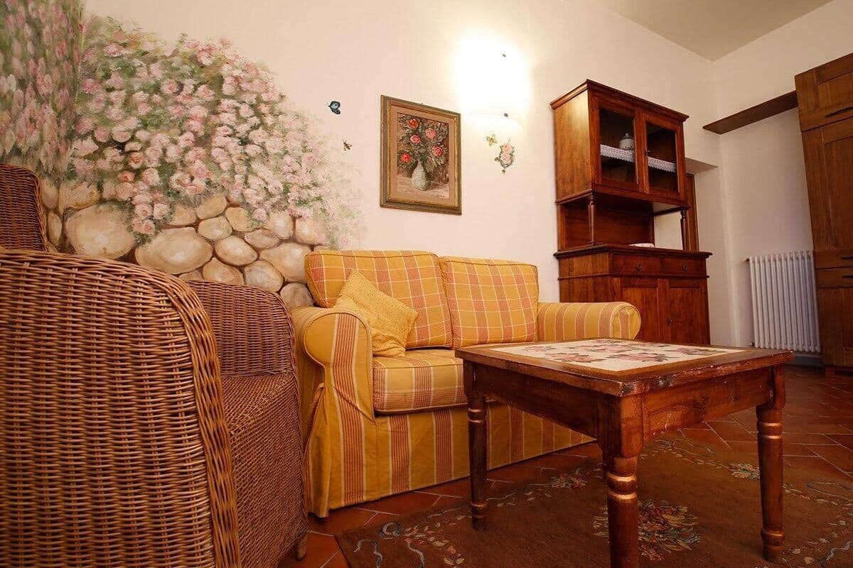 Comfort Apartment, 2 Bedrooms | Living area | 32-inch flat-screen TV with cable channels, TV, fireplace