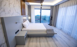 In-room safe, desk, laptop workspace, blackout curtains
