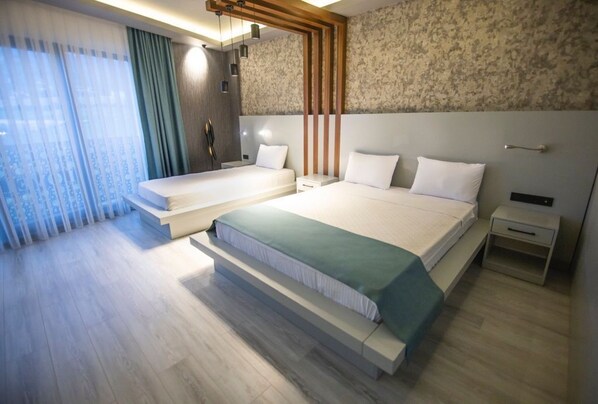 In-room safe, desk, laptop workspace, blackout curtains