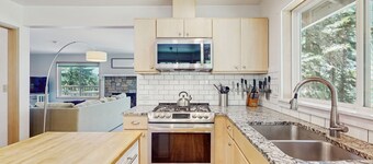 Dog-friendly waterfront home with furnished deck, patio & beach access