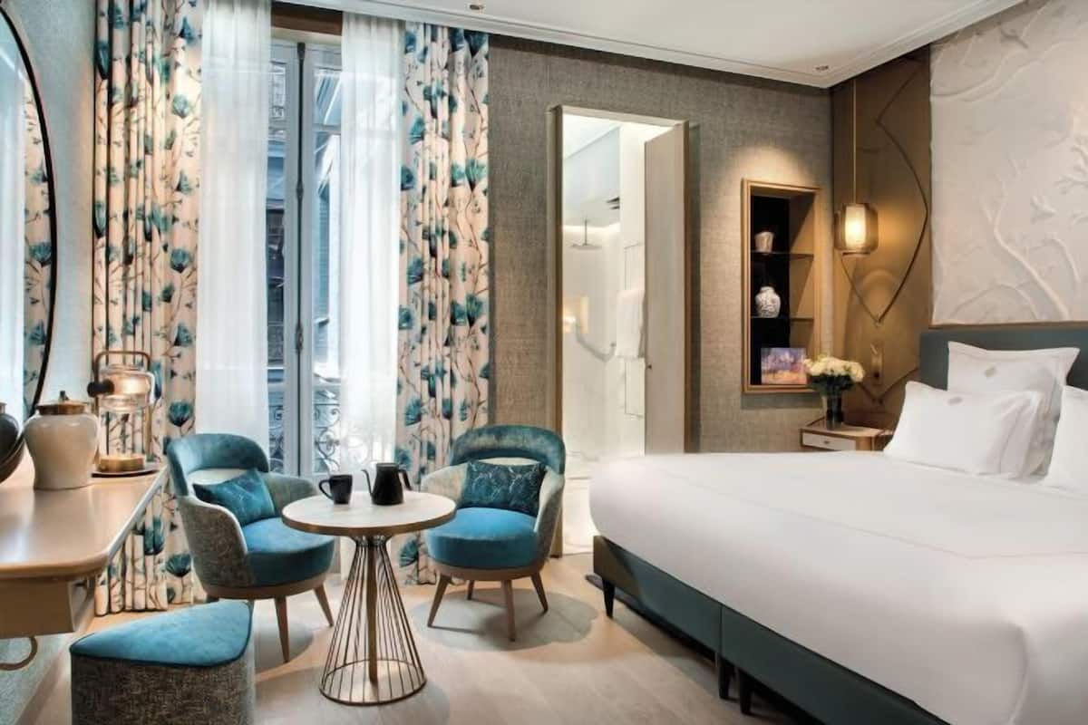 Luxe beddengoed, een kluis op de kamer, verduisterende gordijnen
