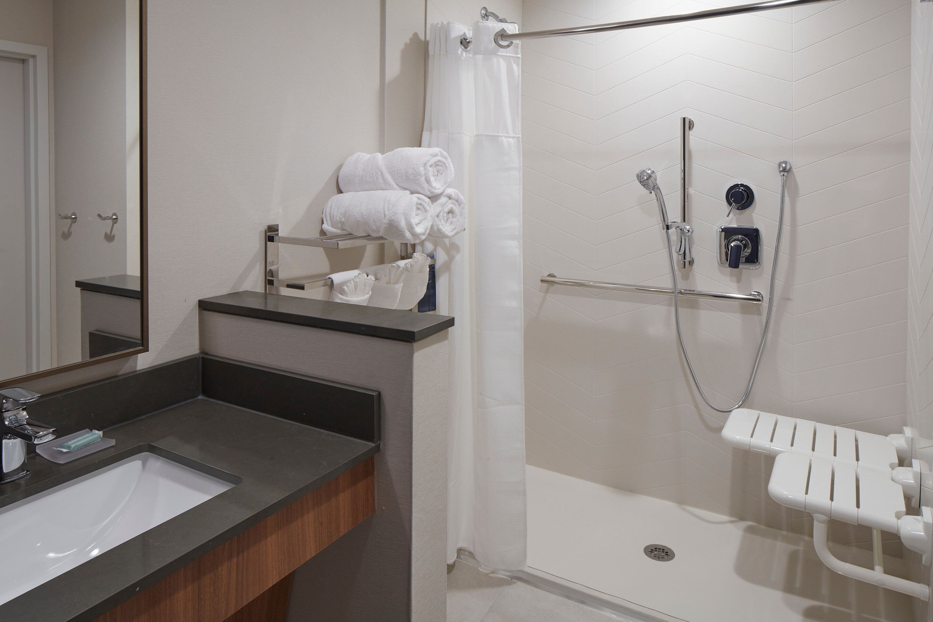 hair dryer, towels, soap, shampoo