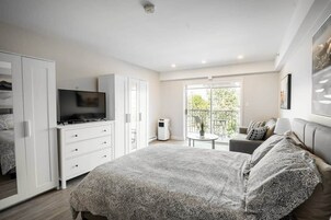 Ropa de cama de alta calidad y tabla de planchar con plancha