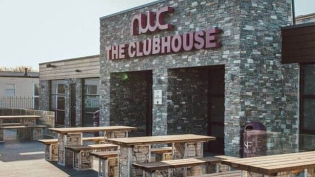A stone building with a sign reading "The Clubhouse." - Lovely 3-bed Caravan in Towyn (Abergele)