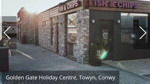 A storefront named 'Fish & Chips' at the Golden Gate Holiday Centre, Towyn, Conwy. - Lovely 3-bed Caravan in Towyn (Abergele)