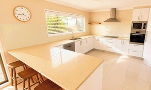 Fridge, microwave, oven, stovetop - Sea Sounds - Ultimate beachhouse with views (Caves Beach)