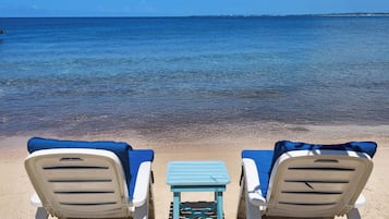 Private beach, white sand, free beach cabanas, sun loungers