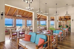 Breakfast, lunch, dinner served; international cuisine, beach views