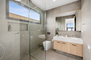 Shower, hair dryer, towels, soap