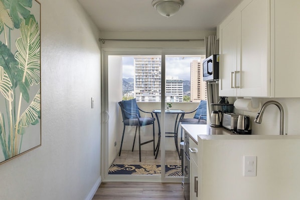 Fridge, microwave, stovetop, coffee/tea maker