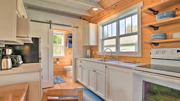 Fridge, microwave, stovetop, coffee/tea maker