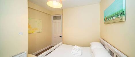 Iron/ironing board, travel crib, free WiFi, bed sheets