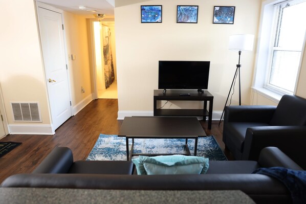 Apartment (1 Bedroom) | Living area | TV - Cozy Stay in Historic St. Louis Building (St. Louis)