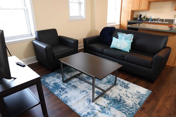 Apartment (1 Bedroom) | Living area | TV