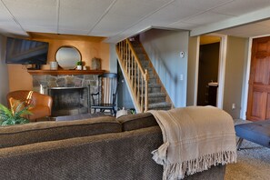 Smart TV, fireplace, books