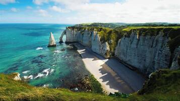 Plage, chaises longues
