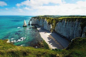 Plage, chaises longues