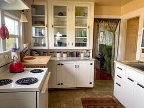 Fridge, microwave, oven, stovetop - Upstairs at TheVictorian - Lush, Walkable, and Dog-Friendly Retreat - Steps from Downtown Bellingham (Bellingham)