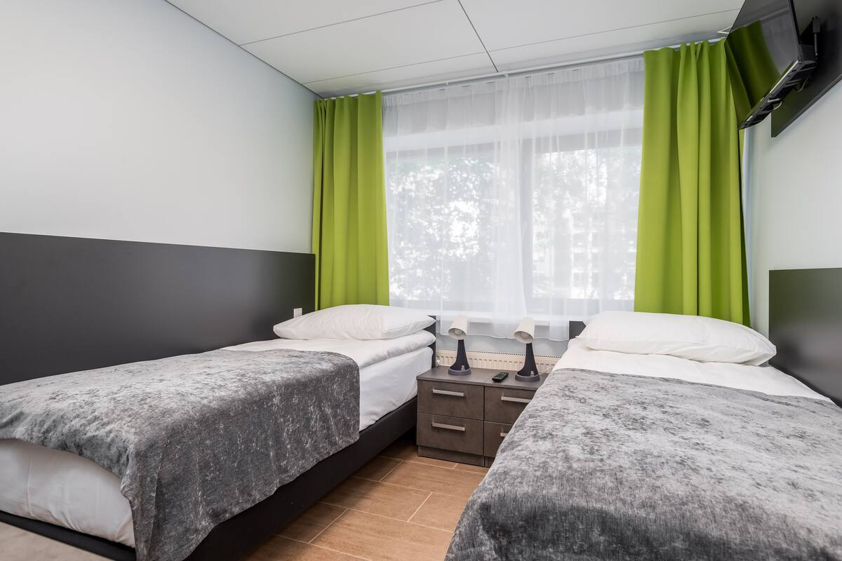 standard twin room | travel cot, free wifi, bed sheets