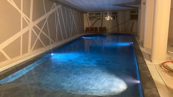 Indoor pool, outdoor pool, open 9:00 AM to 9:00 PM, pool loungers