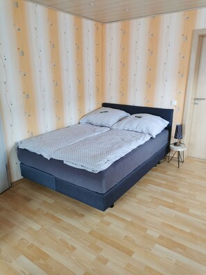 1 bedroom, desk, iron/ironing board, travel crib
