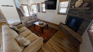 Flat-screen TV, fireplace