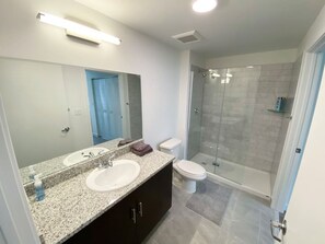 Hair dryer, towels, soap, shampoo