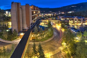 A multi-story parking garage with a curved road leading to a building complex. - Breckenridge Studio at Beaver Run Resort by RedAwning (Breckenridge)