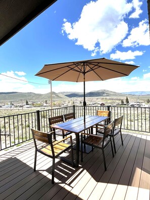 New front deck is perfect for outside dining and enjoying great views.