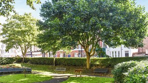 A park with benches, a path, and a hedge. - St Martins Square Apartment 3 (Scarborough)