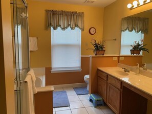 Combined shower/bathtub, hair dryer, towels, soap