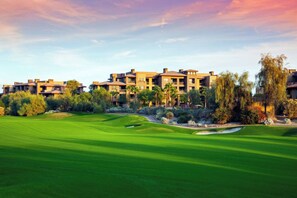 Enjoy a round of golf on our well-maintained fairway, surrounded by a resort with modern architecture and scenic views.