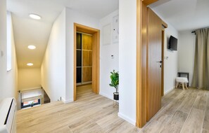 Enjoy a functional and comfortable stay with a TV, seating area, and climate control.