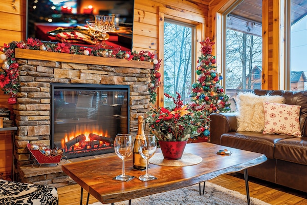 Warm up by the crackling fireplace, enjoy a mug of hot cocoa on a snowy day