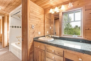Combined shower/bathtub, hair dryer, towels, soap