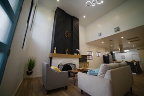 Smart TV, fireplace, books