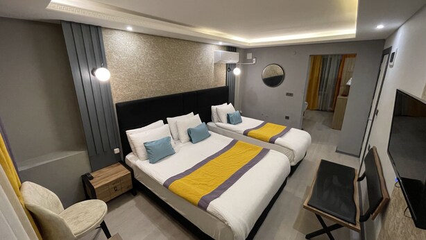 Family Room | Premium bedding, desk, bed sheets - Ulu City Hotel (Bursa)
