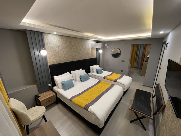 Family Room | Premium bedding, desk, bed sheets - Ulu City Hotel (Bursa)