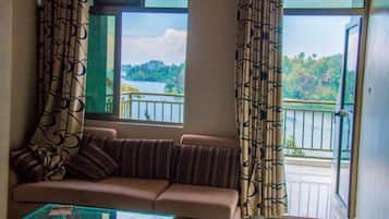 Room, 1 Bedroom | Living area | Flat-screen TV